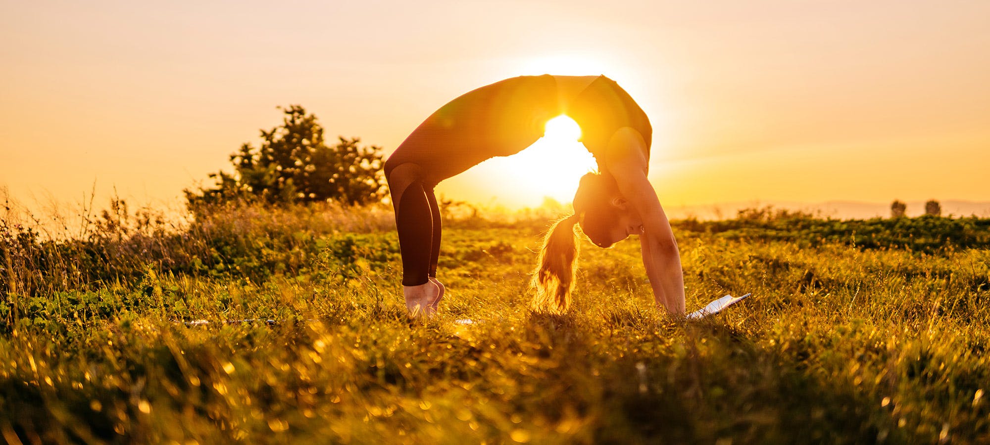 Woman performing a backstand